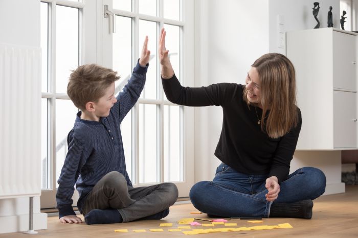 Elev og mentor klapper